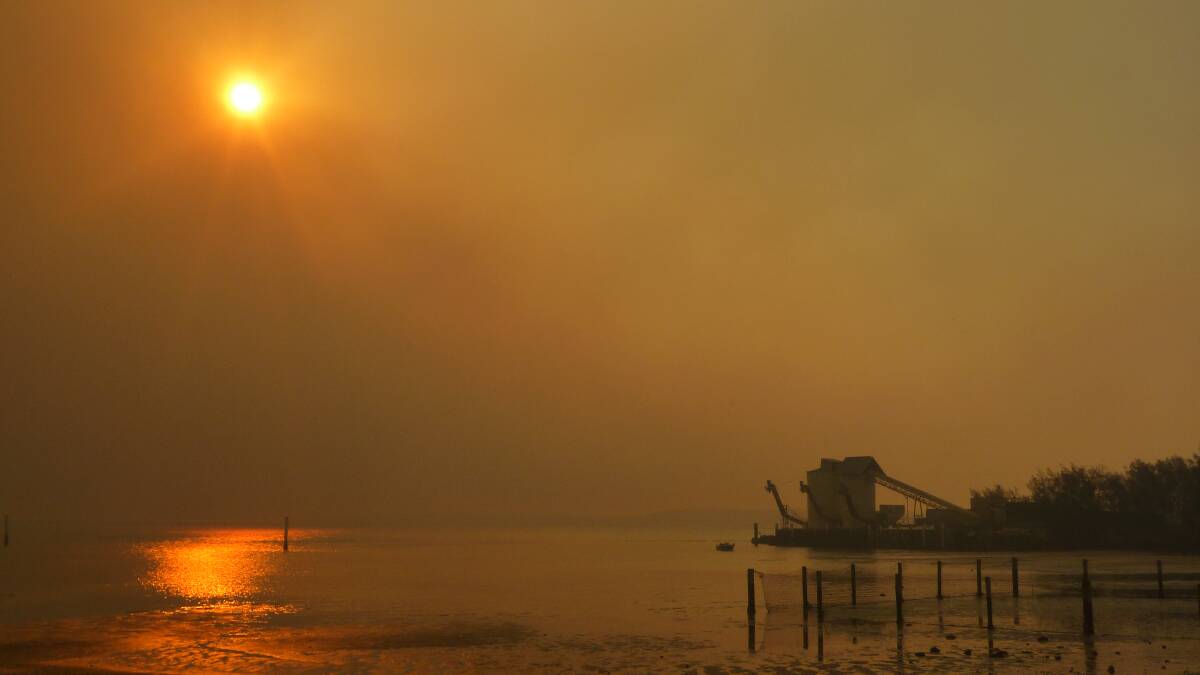 january 4 - Dunwich under the smoke haze from the North Stradbroke Island bushfires.
Photo by Stephen Jeffrey