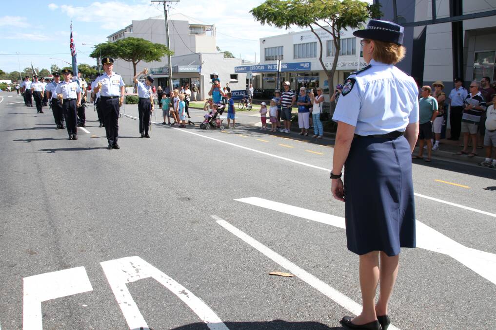 RAAF Freedom of Entry to Redland City: Senior Sergeant Janelle Harm challenges the parade. Photo by Chris McCormack