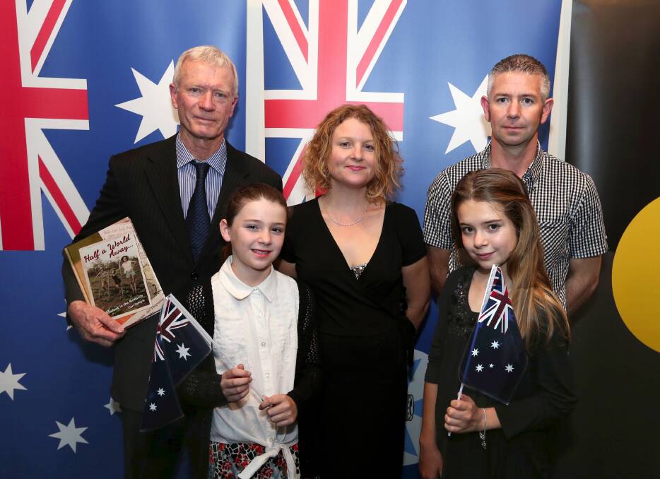 Author Carl Saffigna, left, with the Folds family, Amanda, Ben, Faith and Lily, of Thornlands, at the citizenship ceremony this week. The family was originally from the United Kingdom. Photo by S-L Archer