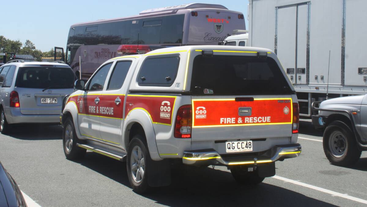 A QFES vehicle waits to board a ferry to North Stradbroke Island on Wednesday. Photo by Stephen Jeffery
