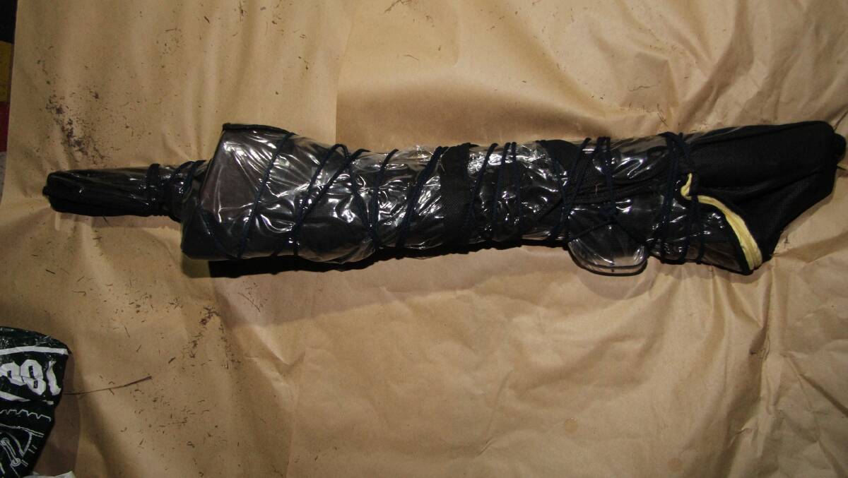 A rifle Taskforce Maxima allegedly uncovered during a raid. Photo: Queensland Police Service.