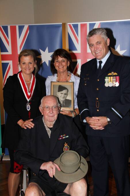 Ken Brell, of Alexandra Hills, front, who served in the RAAF from 1941 to 1945 with, back from left, Redland City Mayor Karen Williams, Redland City Councillor Wendy Boglary and Air Commodore Tim Innes.
Photo by Chris McCormack
