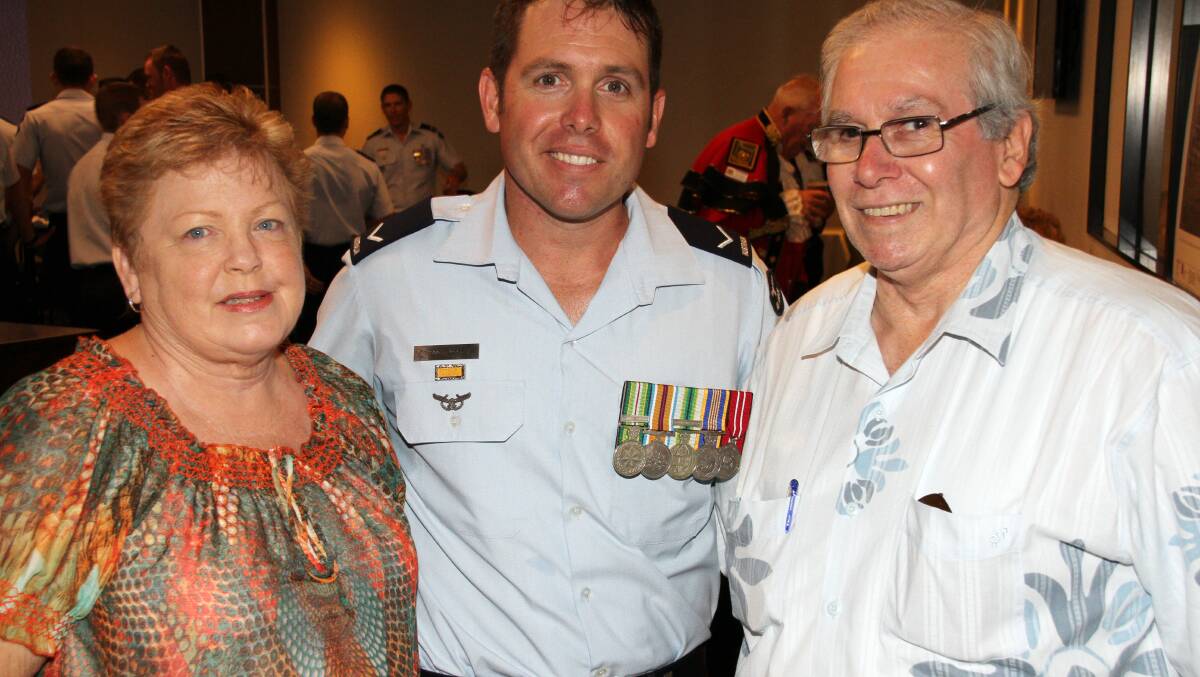 Marilyn and Brian Woodward, of Birkdale, with their son Scott (1 Combat Communications Squadron)
Photo by Chris McCormack