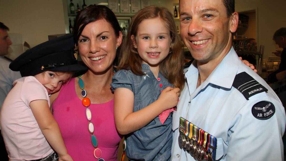 The Camilleri family, from left, Luca, 2, Liz (295 Squadron) Eva, 6, and Mark (1 Sector Squadron), of Bellbird Park. Photo by Chris McCormack