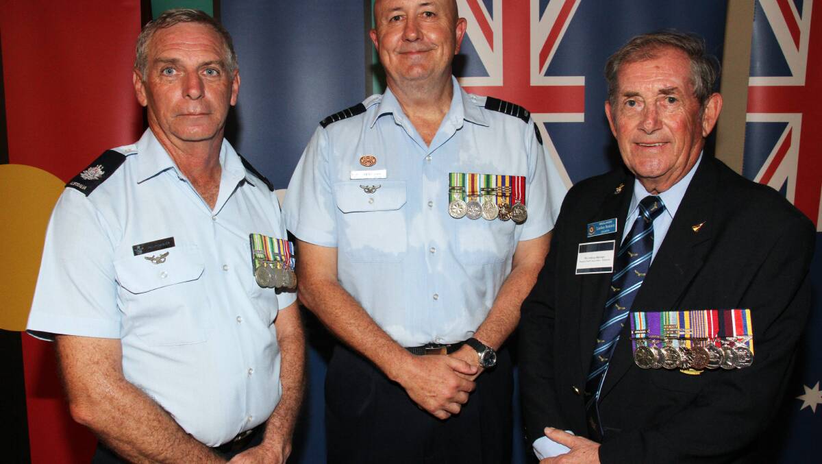 Warrant Officer Phil Barnes, of Redland Bay, Group Captain Peter Davis and RAAFA Redlands President Lindsay Bennett.
Photo by Chris McCormack