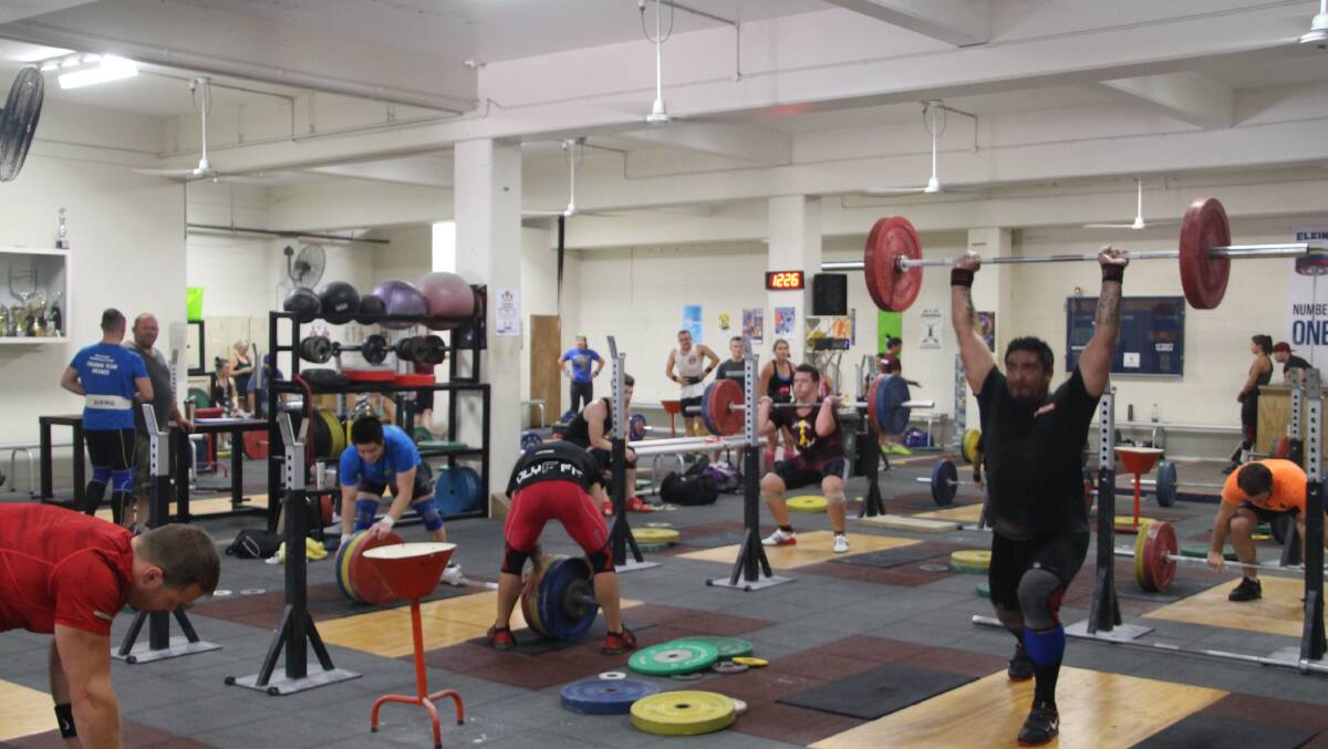 Weightlifters in training at Cougars club 