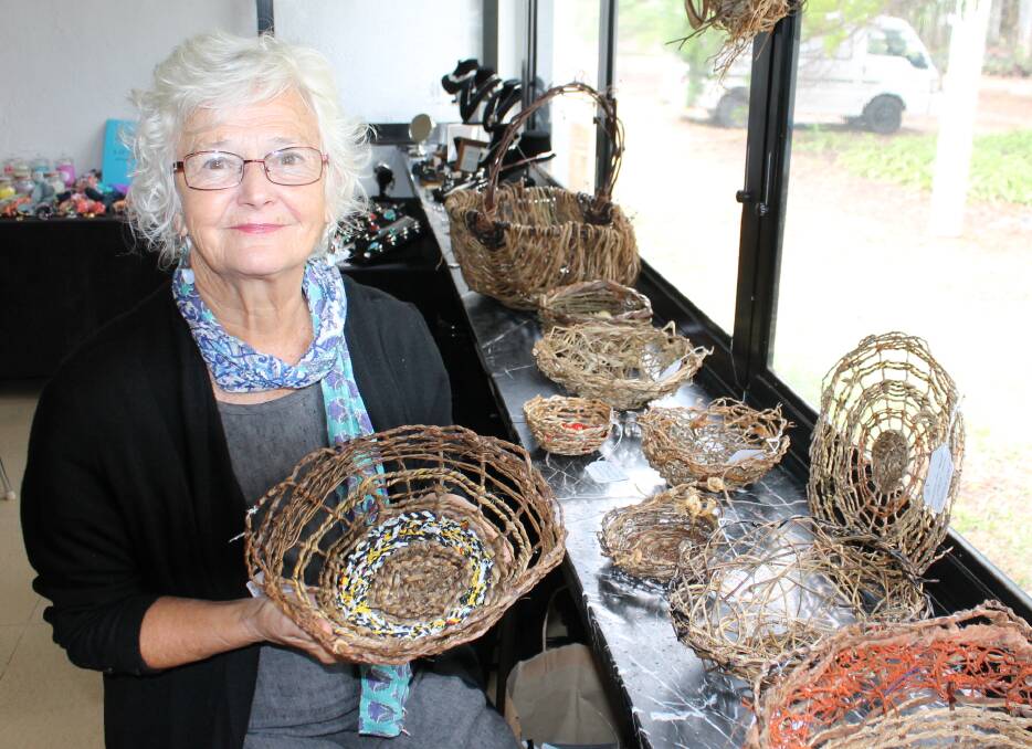 HANDMADE GIFTS: Coochiemudlo Island fibre artist Jacqui Creswell and her artisan baskets. 