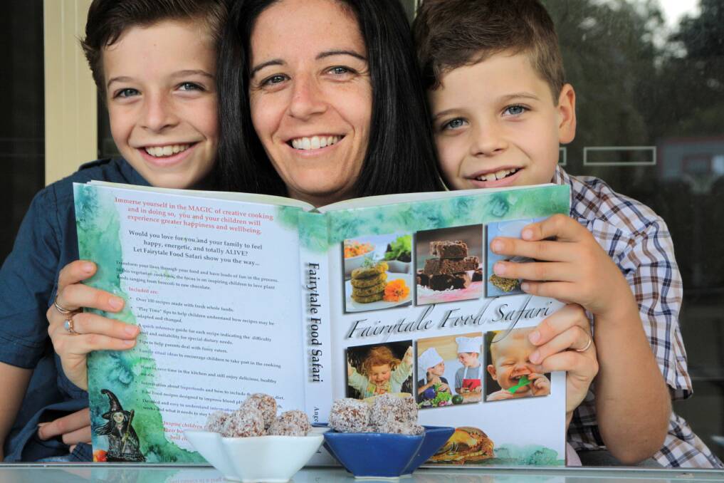 FUN WITH FOOD: Fairytale Food Safari author Angela Stafford with sons Ethan, 10, and Ryan, 8. 
 Photo: Chris McCormack