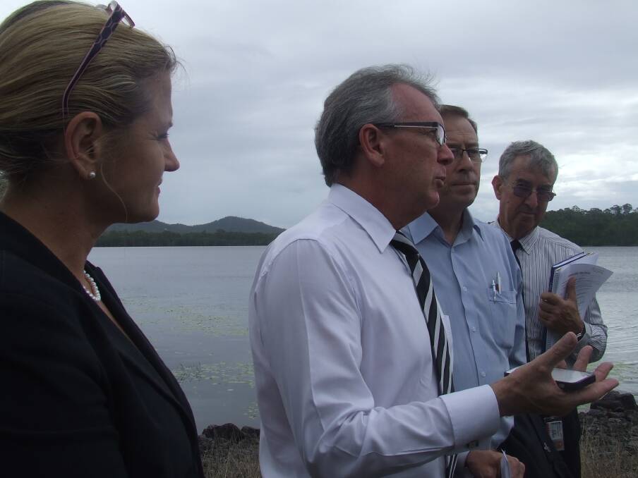 Redland mayor Karen Williams listens as Water and Energy Minister Mark McArdle speaks about plans to open up Leslie Harrison Dam to recreational sports.