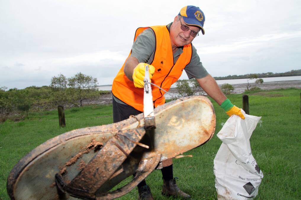 George Type from the Redland City Lions Club cleans up around Oyster Point, Cleveland.Photo by Chris McCormack