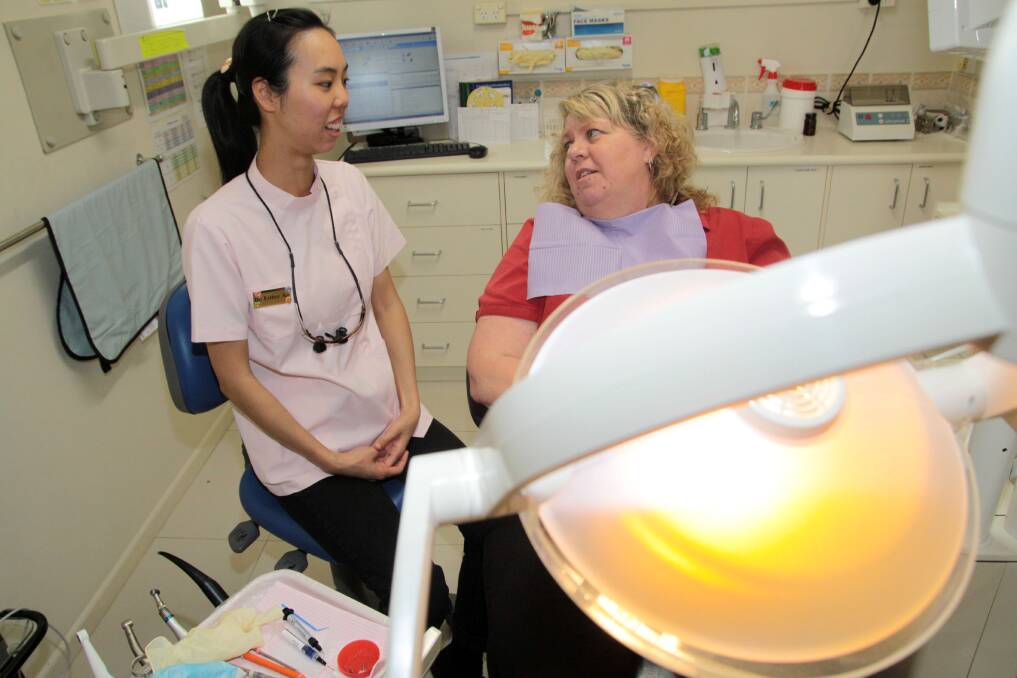 Alexandra Hills Dental Practice dentist Esther Ko said dentists were working to finish off all dental work for those on the Chronic Disease Dental scheme before the November 30 expiry date. 
 
Photo by Chris McCormack