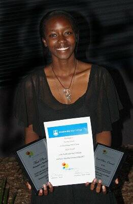 Birthday girl, Natasha Dusabe, from South Africa is all smiles after her win in the persuasive speaking category .