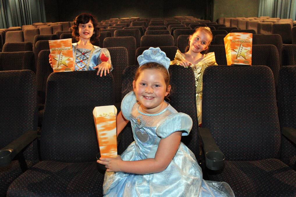 DECEMBER: Birch Carroll and Coyle Cinema's Capalaba - Emma Donnellon (centre) with l-r- at back - Charlotte Saxby and Kayla Risson are set for the Disney Princess Film Festival. Photo by Chris McCormack