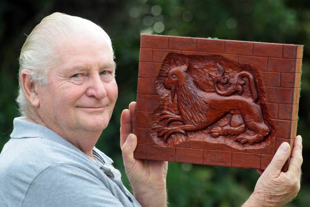 JUNE: Ron Thompson of Redland Bay with his carving of a Griffin he will enter in the Ekka. Photo by Chris McCormack