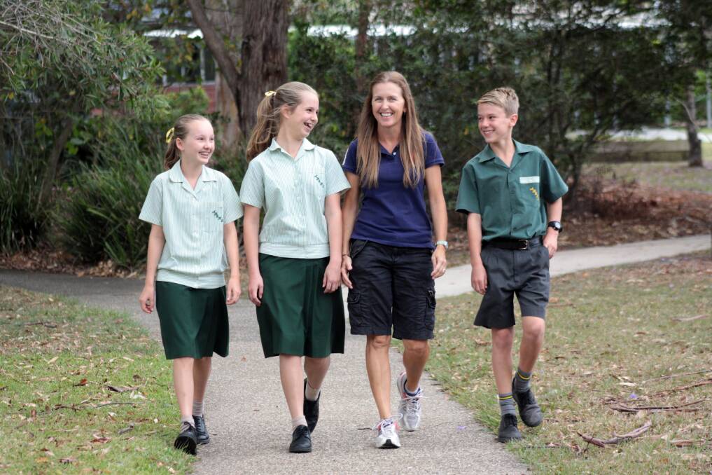 OCTOBER: 2013 inspirational teacher awardee Sharon Davis with year 7 Alexandra Hills State High School students Emma Loweke, Carly Tomkinson and James McCabe, all 12 years. Photo by Chris McCormack