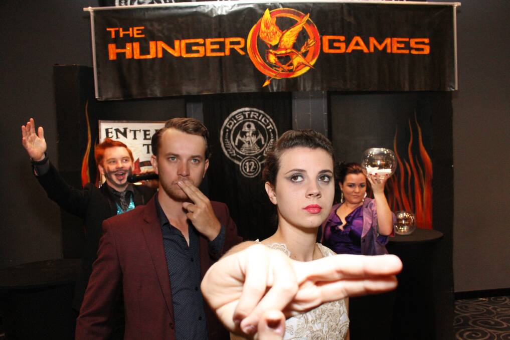 NOVEMBER: Hunger Games promo at Capalaba Cinemas -  Taylor Cue and Natalie Howatson (front) with  Nathaniel Kitchin and Emma Hillman at back. Photo by Chris McCormack