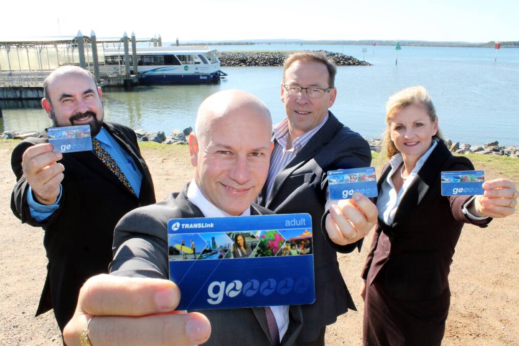 JUNE: Councillor Mark Edwards, Assistant Minister for Public Transport Steve Minnikin, Redlands MP Peter Dowling and Mayor Karen Williams herald the adoption of the translink area and go cards extending to the Southern Moreton Bay Islands. Photo by Chris McCormack