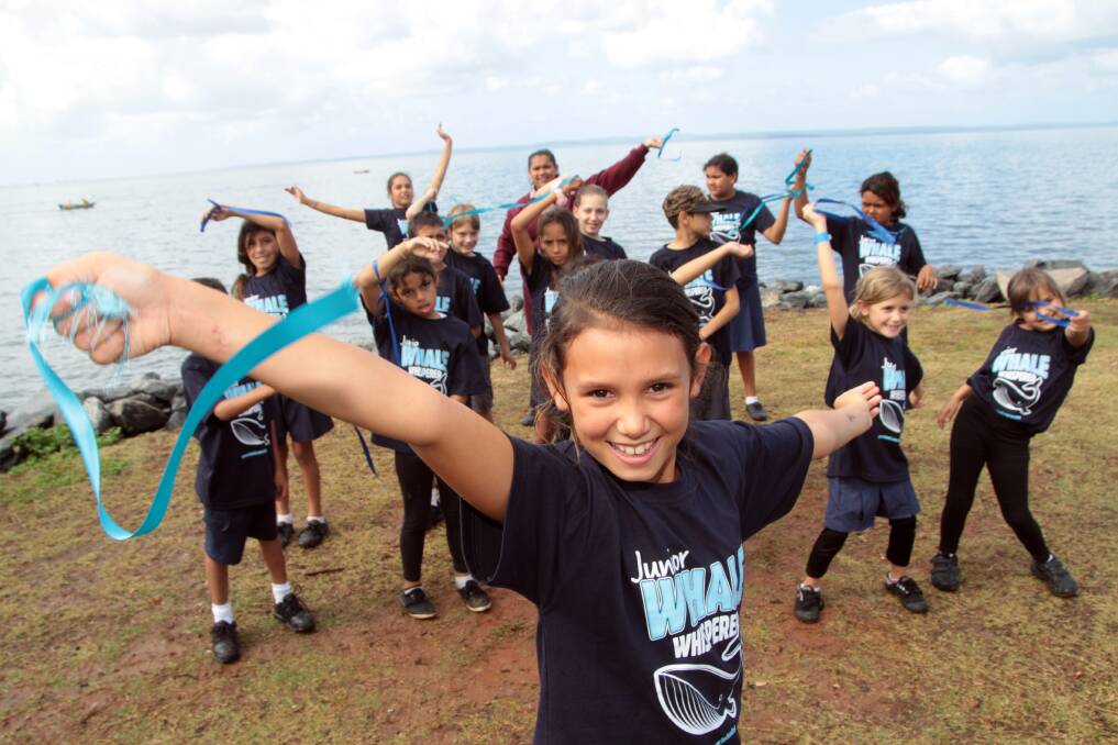 MAY: Mimi Moreton-McDougall, 11 of Dunwich dances a whale dance with the other "Whale Whisperers" at Wellington Point. Photo by Chris McCormack