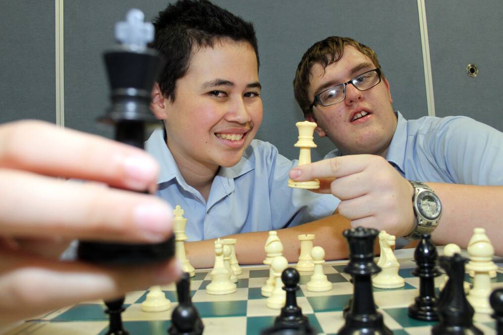NOVEMBER: Capalaba State College year 10 Chess champion William Taunoa - Vesty, 15 and third place getter  fellow student Brad McDonald, 16. Photo by Chris McCormack