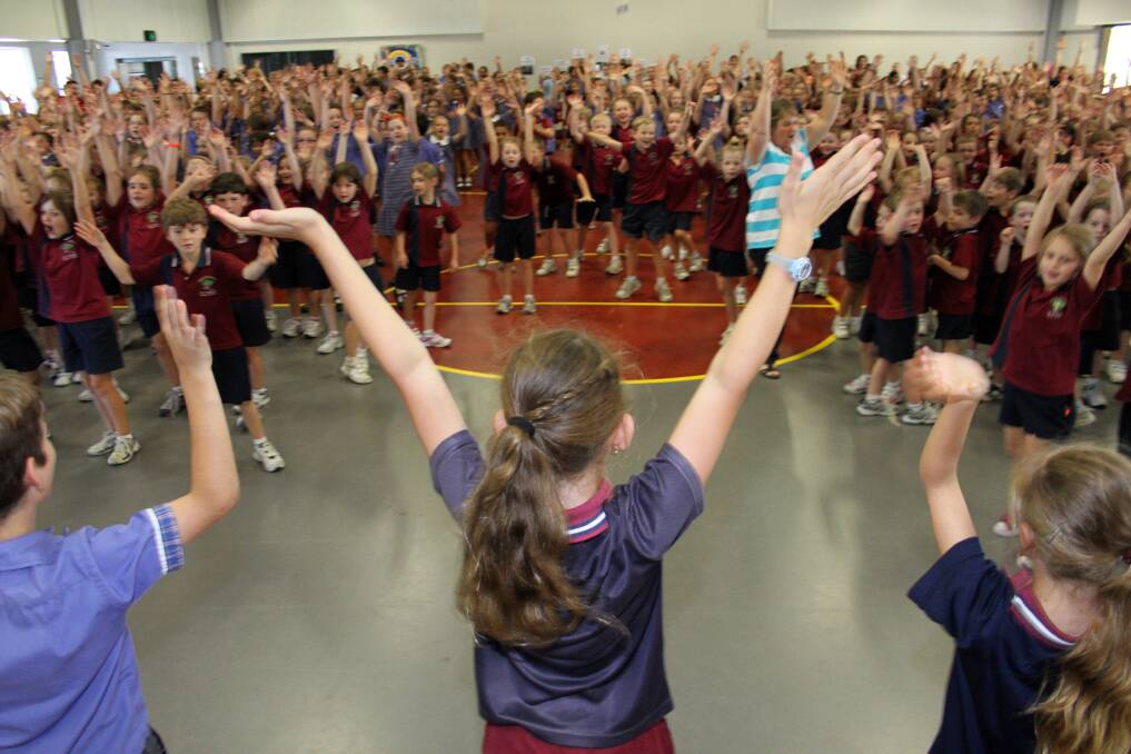 DECEMBER: A flash mob dances with the whole school at St Rita's final assembly. Photo by Chris McCormack
