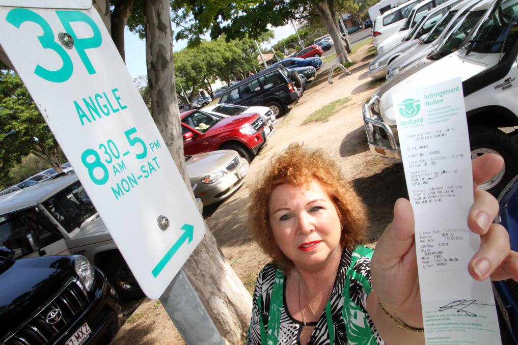 DECEMBER: Aileen Scott of Ormiston received a parking fine outside Woolworths and is concerned that a three hour parking limit all day Saturday is a deterrent to people shopping in Cleveland . Photo by Chris McCormack