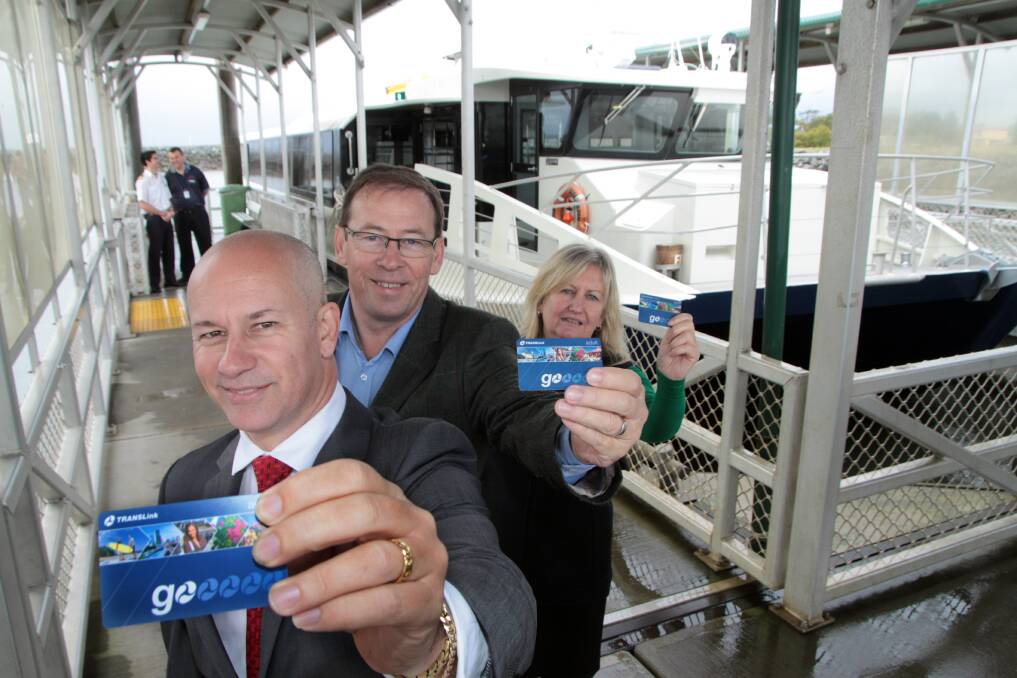 JULY: Assistant Minister for Public Transport Steve Minnikin, Member for Redlands Peter Dowling and  Deb Wilson from Bay Islands Transit System (BITS) with the go cards being used for the first time on BITS. Photo by Chris McCormack