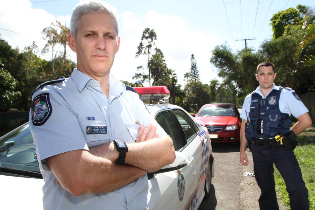 NOVEMBER: Senior Sergeant Andrew Gillies and Constable Stuart Power are urging motorists to keep cars locked and valuables secure after a raft of car break ins in the Redlands. Photo by Chris McCormack