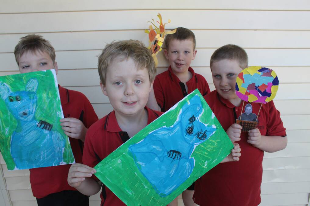 AUGUST: Redlands Special School promo for Art and Hand Made Spring Fair - Jayden Parsons (front) with left to right at back - Ethan Jensen, Justin Gant and Samuel Clough with their art work. Photo by Chris McCormack