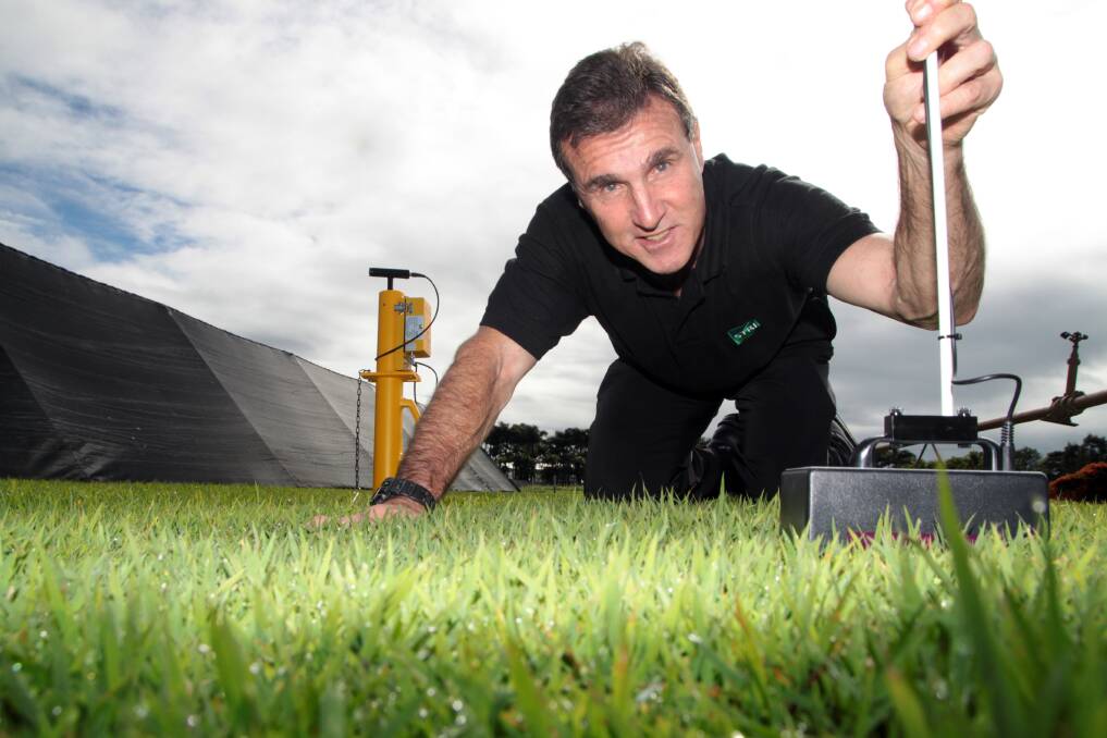 JULY: Keith McAuliffe - head of consultancy for services for Sports Turf Research Institute Australia inspects the turf plots. Photo by Chris McCormack