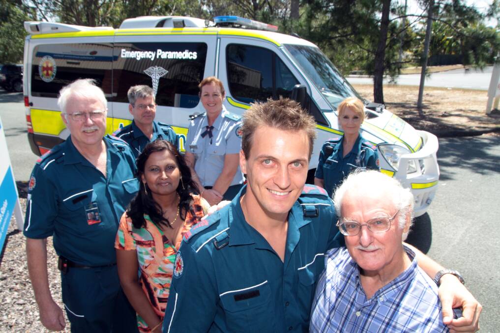 OCTOBER:  Paramedic Jan Geertseema and Bryan Sandall (front) with from left - paramedics Pat Moloney and  Russell Beacham, Meenu  Sandall, communications supervisor Vivienne King and paramedic Joanne Mills . Photo by Chris McCormack