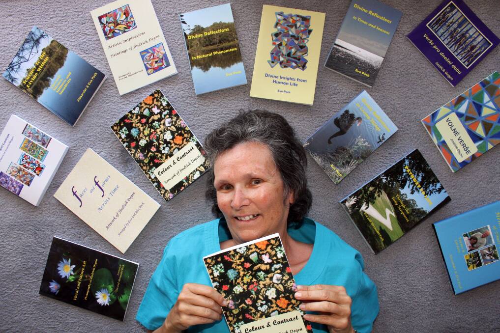 NOVEMBER: Eva Peck with some of the self published books she has done. Photo by Chris McCormack