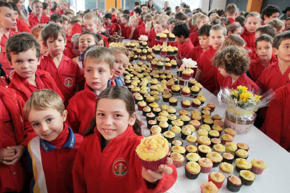 JUNE: Star of the Sea primary school grade prep student Baylee Langley joined all her school mates in celebrating a biggest morning tea with over 300 cupcakes. Photo by Chris McCormack