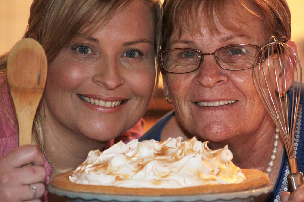 JULY: Michelle and Jacqueline Molyneux of Alexandra Hills are cooking up a storm to enter in the Ekka baking competition. Photo by Chris McCormack