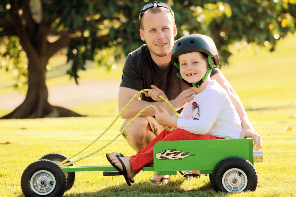 AUGUST: Adam and son Lockyer Woods, 5 of Capalaba are ready to roll in the Billycart championships on August 18. Phot by Chris McCormack