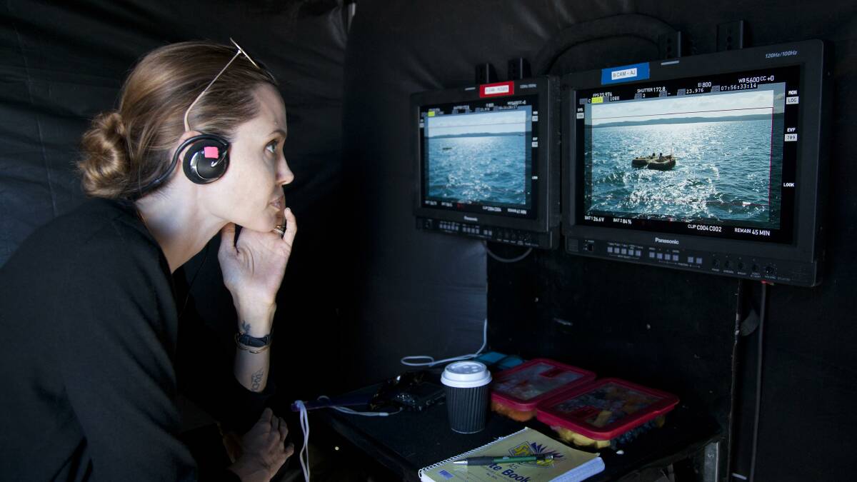 Angelina looks over the first day's filming of Unbroken on Moreton Bay. Photo Universal Pictures
