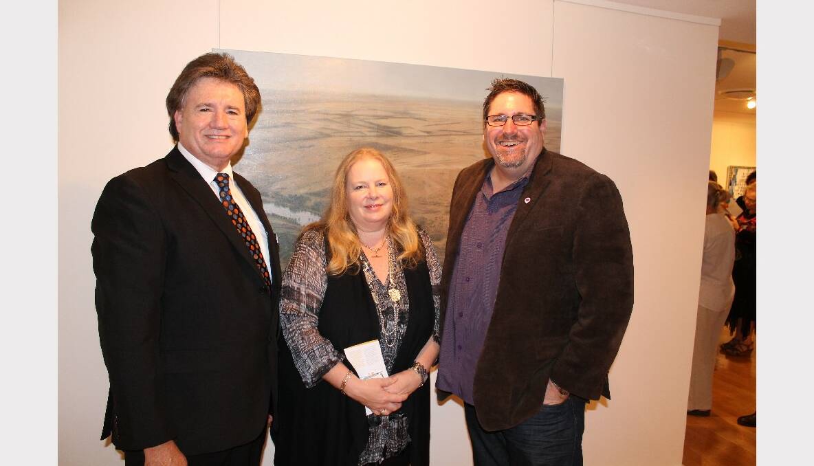 Cr Lance Hewlett, Sheena Hewlett and Member for Capalaba, Steve Davies at the official opening of the Redland Art Awards.