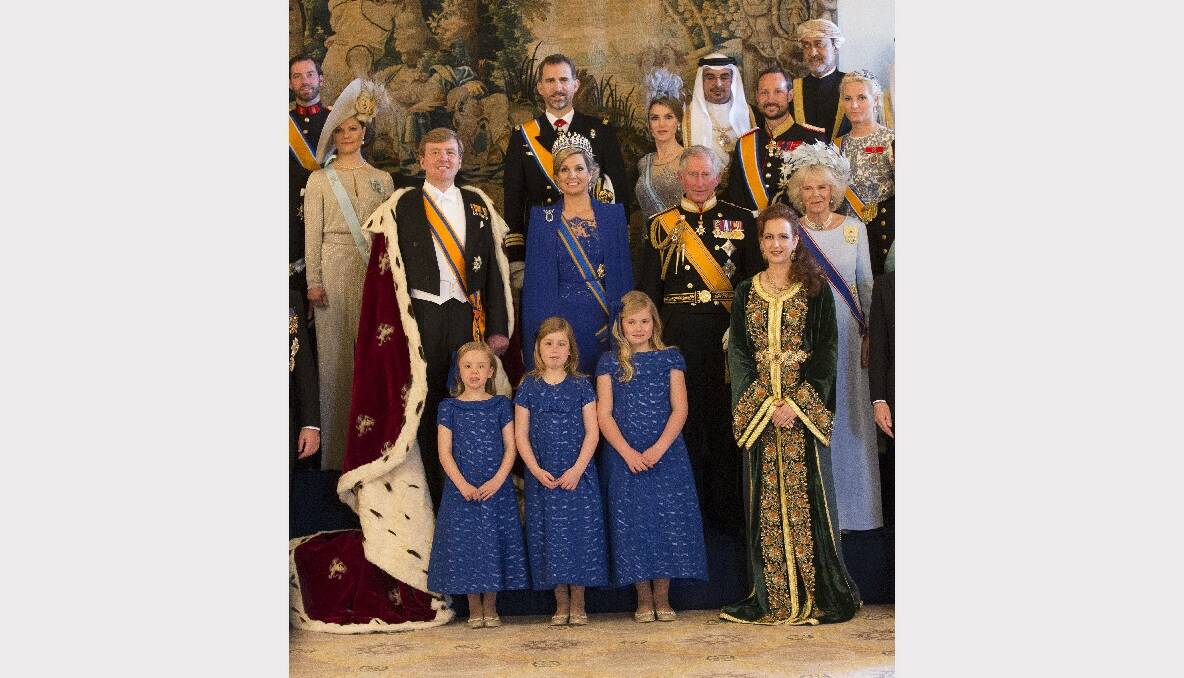  King Willem Alexander and Queen Maxima of the Netherlands pose with guests following their inauguration ceremony, at the Royal Palace