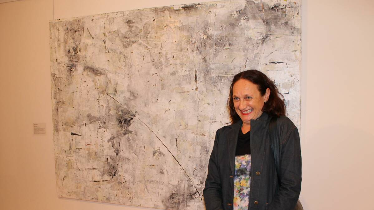 A very happy Claudine Marzik with her first prize award winning painting in the Redland Art Awards. Visit the Redland Art Gallery, Cleveland until December 2 to view the Redland Art Awards 2012 exhibition, featuring works from the 45 competition finalists.