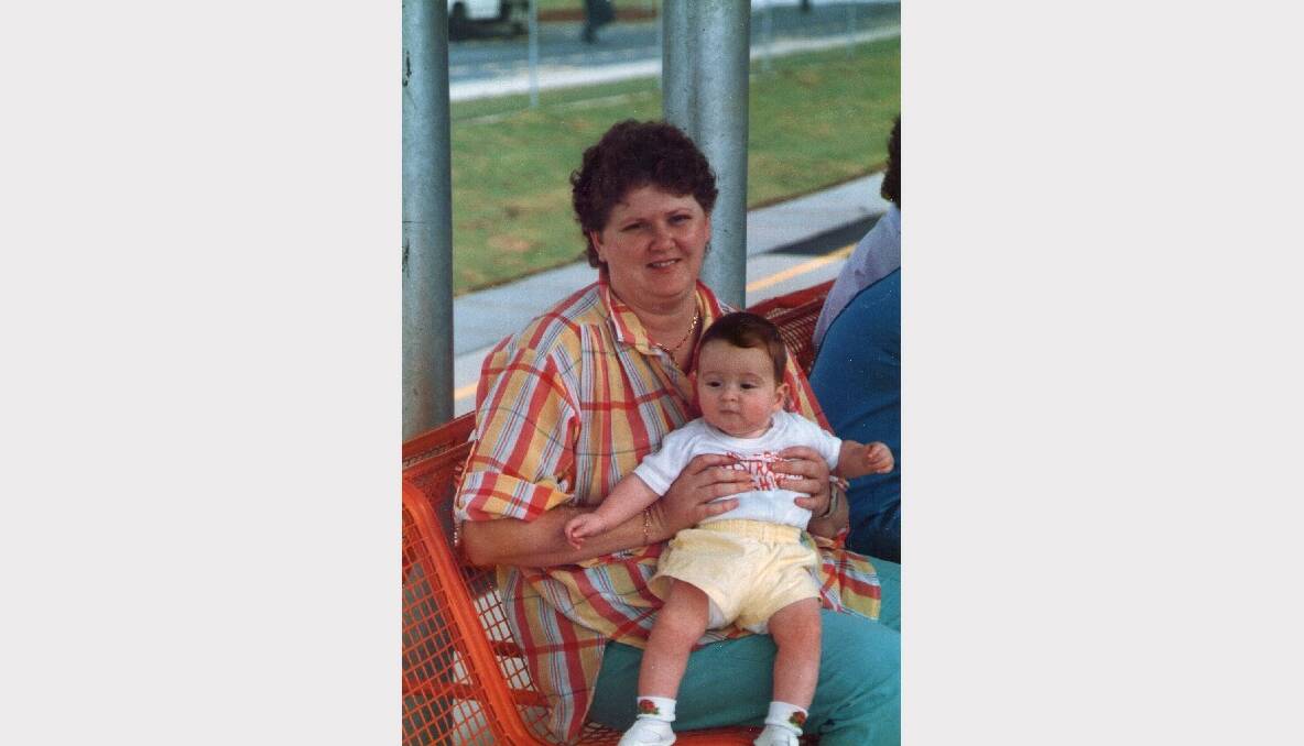 Ryan McConnell with his mum, Glenda, as a baby, when the railway to Cleveland was reopened in 1987.