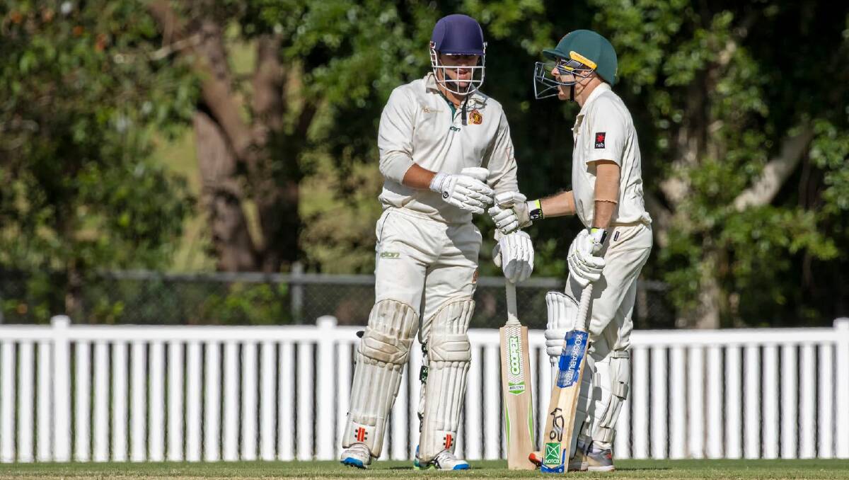 DREAM TEAM: Michal Strauss and Scott McAuliffe batted well to put the Redland Cricket Club's third grade team into the final. Photo: Doug O'Neill