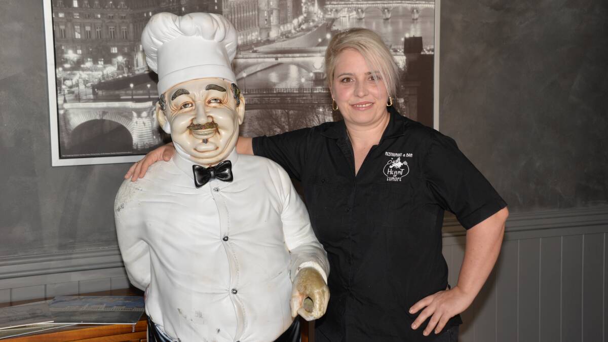 REUINITED: Restaurant owner Ildiko Simon was relived and excited when the beloved statue was returned.