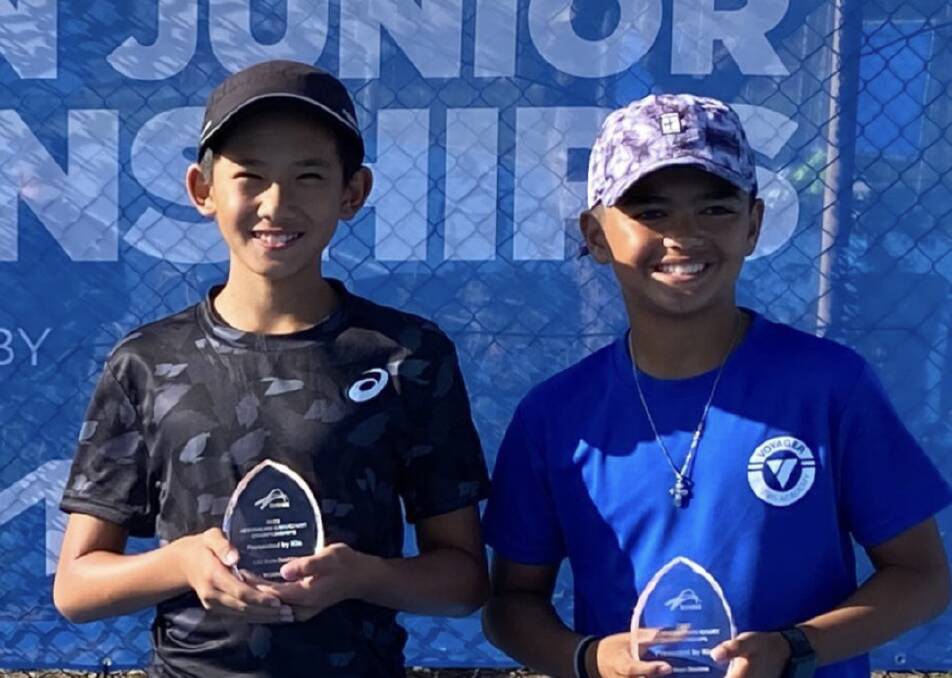 Ethan Domingo with tennis partner and Redland star Heaton Pann after their U12 boys doubles win at the Australian Junior Hardcourt Championships. Picture supplied