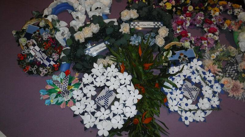 REMEMBERED: Students made wreaths in their classrooms for the service.