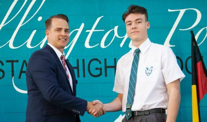NO SKIPS: New Wellington Point State High School principal Ross McNichol with perfect attendance achiever Ben Standring.