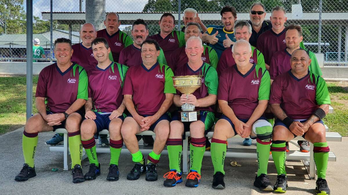 TEAMMATES: The Redlands Hockey Association Masters side faced tough competitors at the state championships but were all smiles bringing out the Redlands Cup. Picture: supplied.