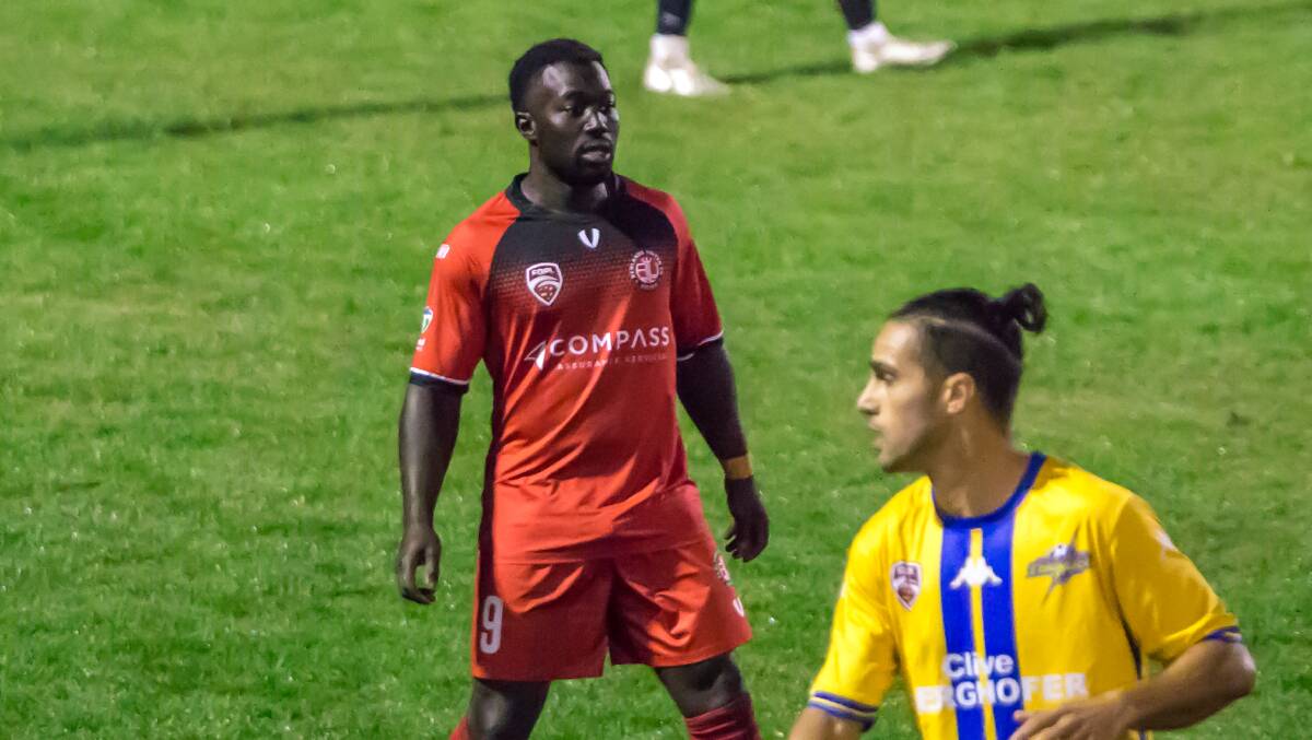 Red Devils' Ben Njie scored his second goal within the week for Redlands United to seal the win over SWQ Thunder. Picture by Ray Gardner.