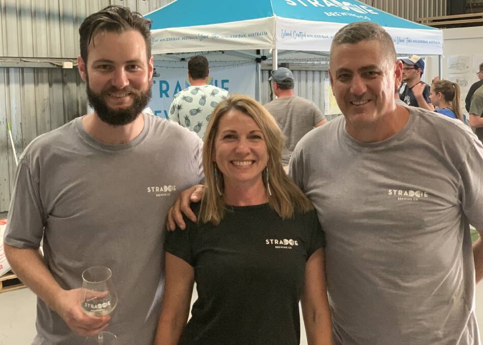 SOMETHING BREWING: Straddie Brewing Company head brewer Andrew Sydes and owners Kylie Taylor and Troy Beavan won a slew of awards at the Australian International Beer Awards. Picture: supplied.