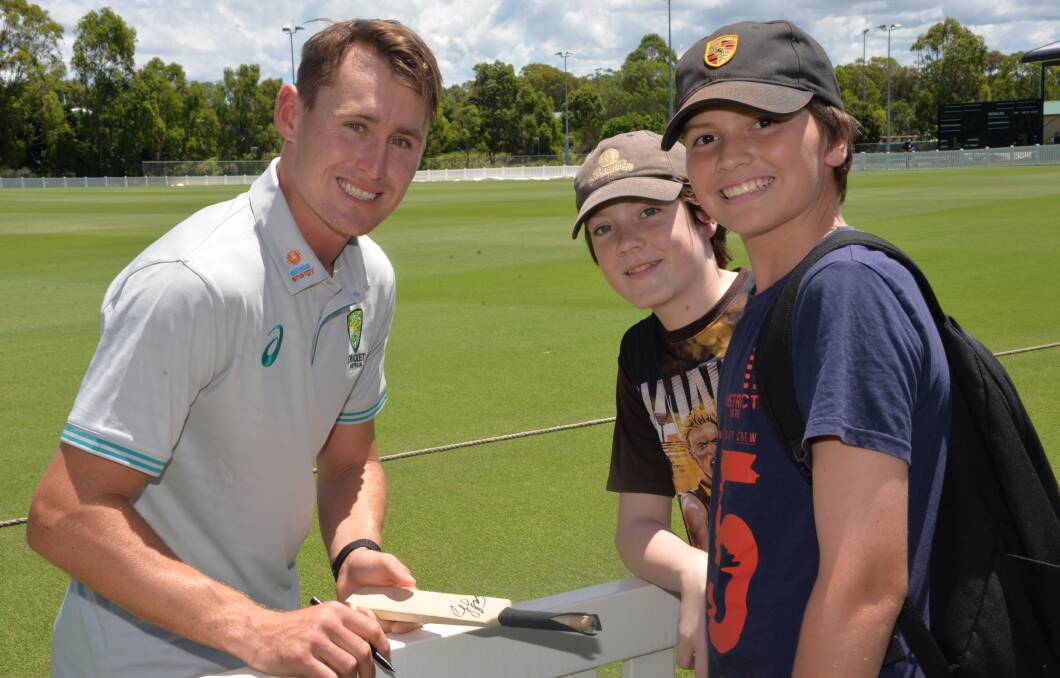 SUPER FANS: Australian cricketer Marnus Labuschagne with cricket fans Mitchell Murrihy and Cameron Raferty. Photo: Emily Lowe.