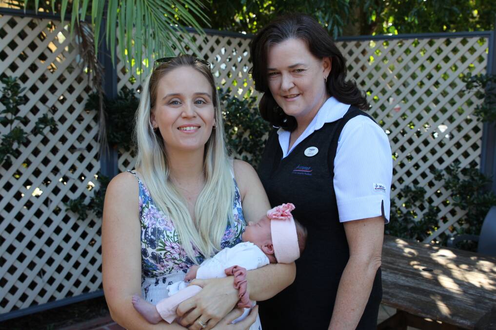 NEW MUM: Samantha Fragale welcomed baby Isabella at Mater Private Hospital Redland with the support of midwife Janice Butler. Picture: supplied.