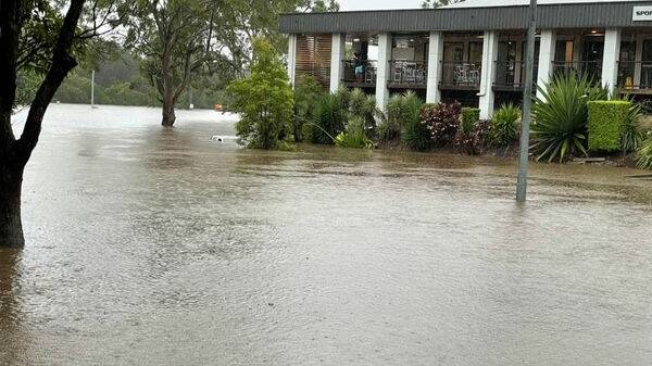 GOING UNDER: The greyhound track at the back of the Capalaba Tavern has been inundated by flood waters. Photo: Dan Brown.
